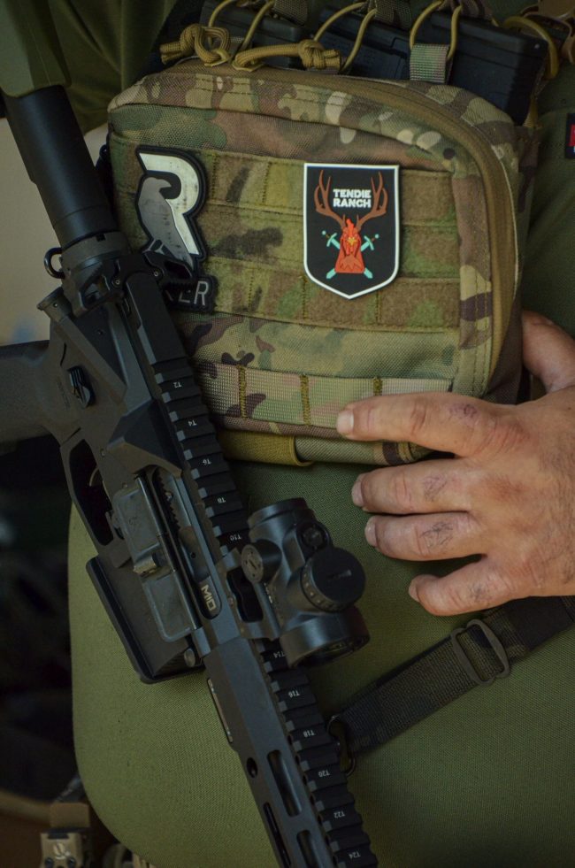 rifle shown with body armour